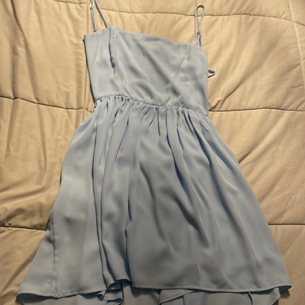 Baby blue, wore it for homecoming once, very light easy to adjust if need